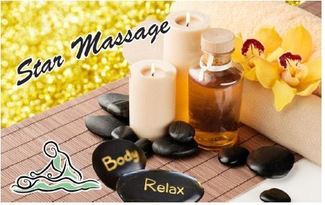 Massage room with towels and oils